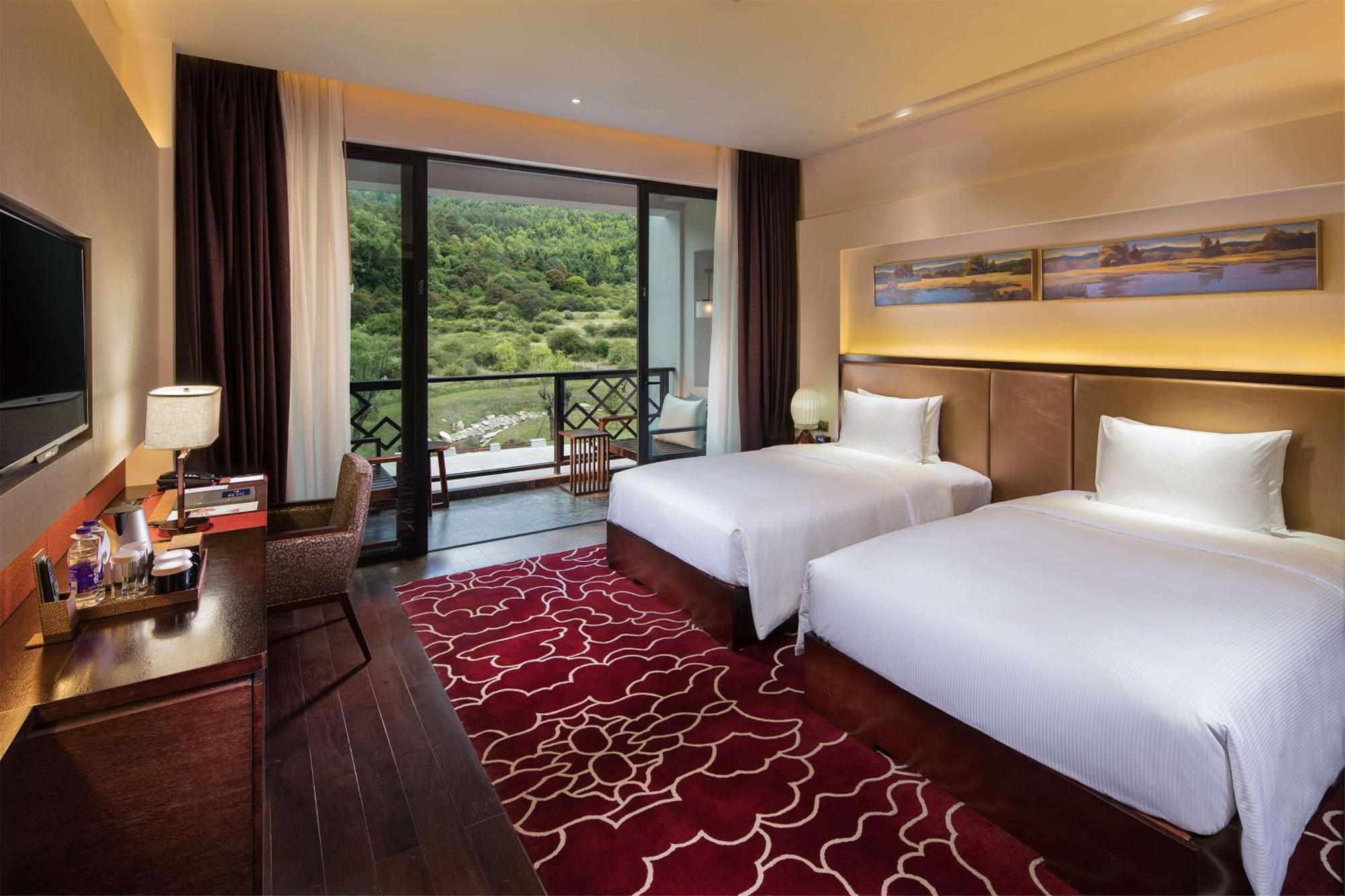 Hilton Linzhi Resort Ньїнгчі Екстер'єр фото