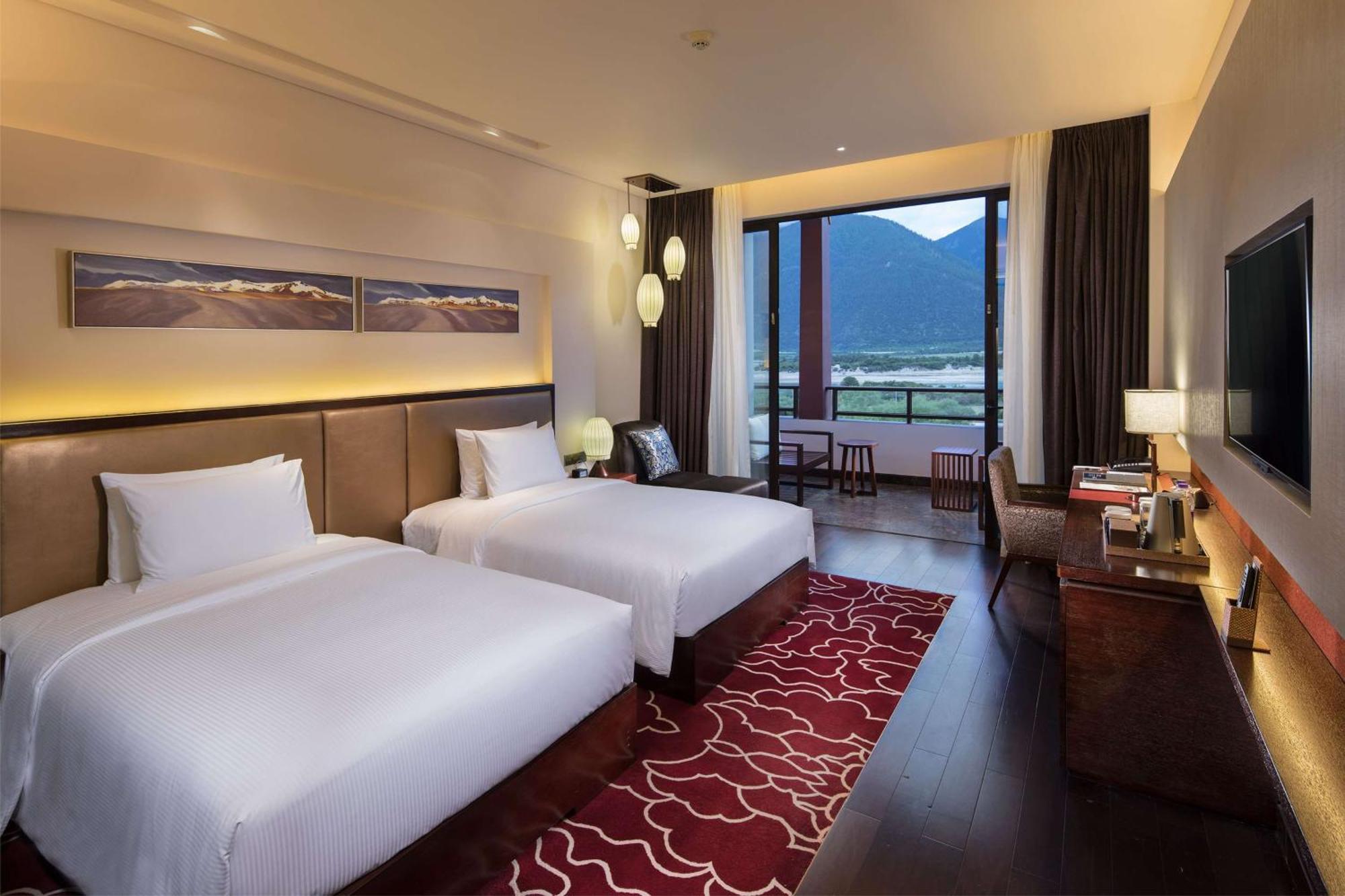 Hilton Linzhi Resort Ньїнгчі Екстер'єр фото