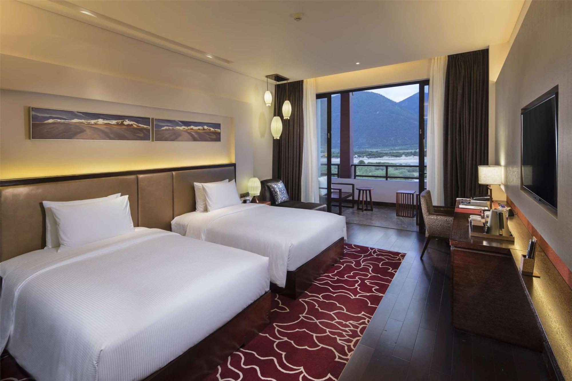 Hilton Linzhi Resort Ньїнгчі Екстер'єр фото