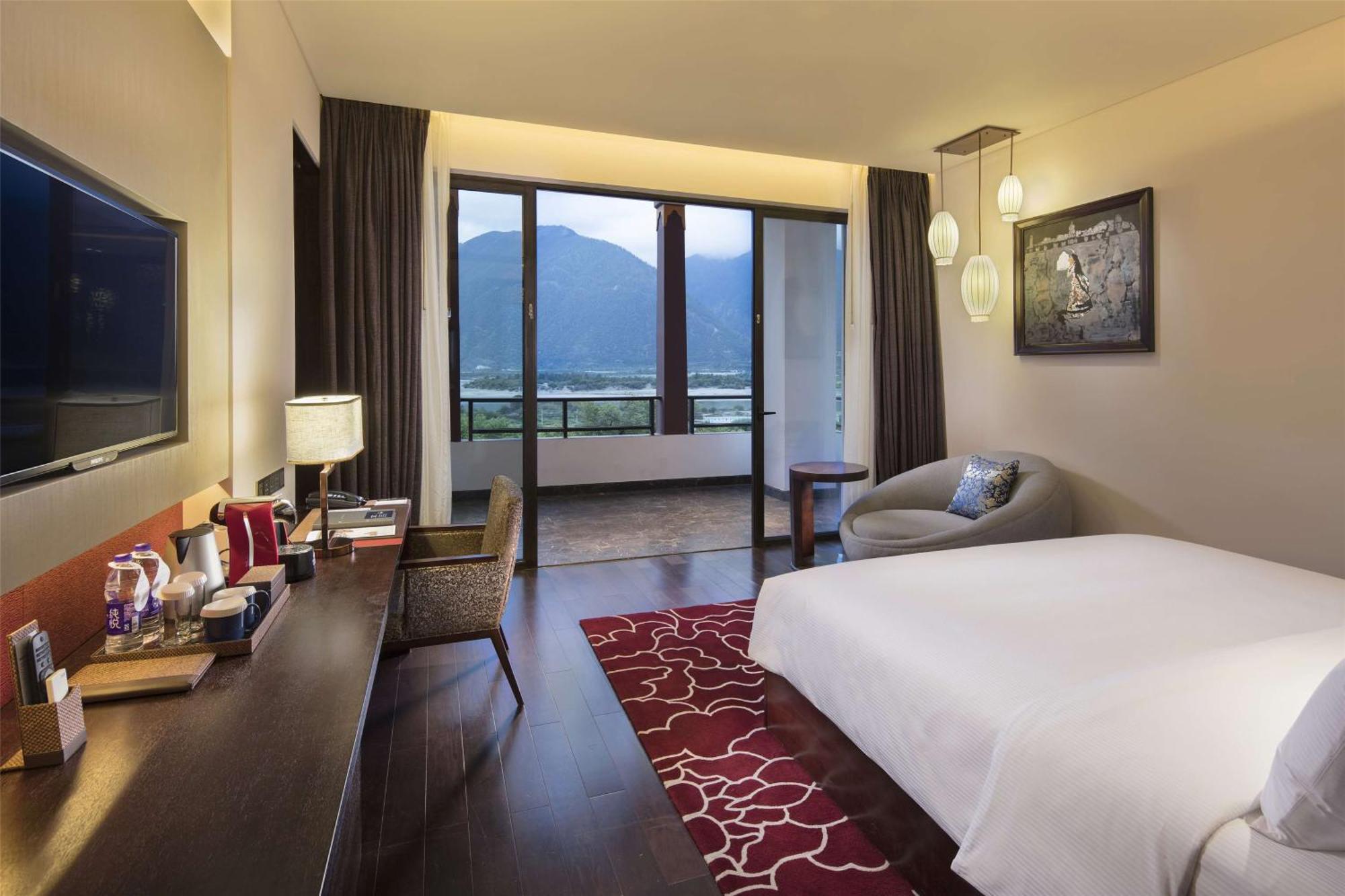 Hilton Linzhi Resort Ньїнгчі Екстер'єр фото